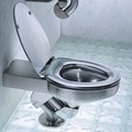 Metaal Toilet Configured for In-Wall Flushing System